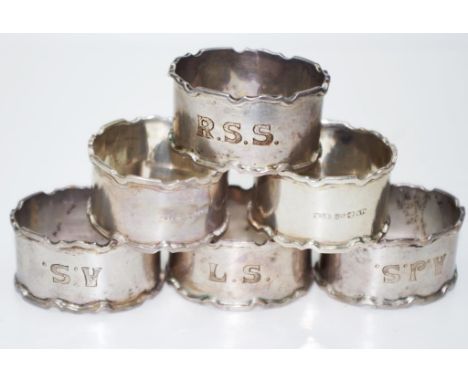 Set six vintage sterling silver napkin rings each marked ' 925,' and each monogrammed, (weight 128grams approx, total).