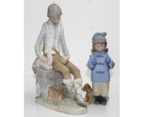 Nao Spain seated boy with lamb figure marked to base, (height 26cm approx); together with a Nao standing boy figure, (height 