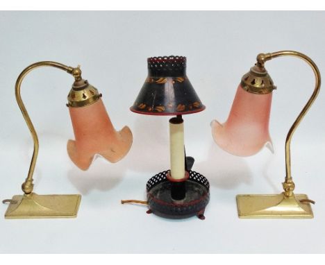 A 19th century style tin student's lamp, height 32cm, together with a pair of brass desk lamps with pink frosted glass shades