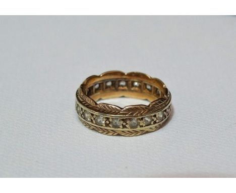 A 9ct gold (tested) bi-colour eternity ring set with clear stones, weight 4g approximately.