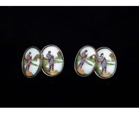 A pair of 925 silver and coloured enamel anglers cufflinks, each oval set with a coloured enamel painted with a fisherman in 