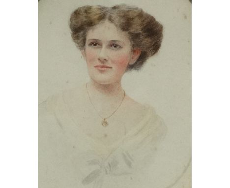 An Edwardian watercolour, an oval portrait of a young lady, indistinctly signed, framed and glazed, image 17 x 13cm. 