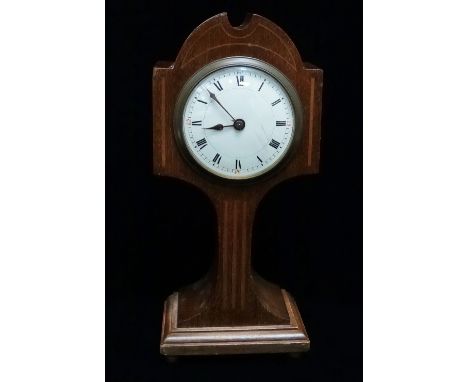 An early 20th century mahogany Art Nouveau style mantle clock with white enamel dial and Roman numerals, height 28cm. 