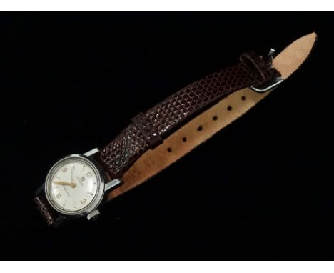 An Omega Ladymatic manual wind wristwatch in stainless steel case, the 14mm cream dial with gilt baton and quarter Arabic num