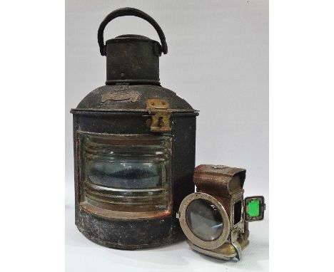 A ship's starboard lantern, together with an early Joseph Lucas bicycle lamp. 