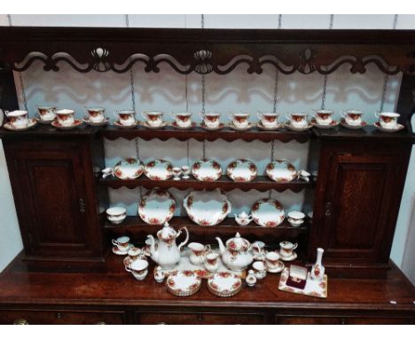 A Royal Albert 'Old Country Roses' pattern tea/coffee service comprising a coffee pot, a teapot, fourteen tea cups and saucer