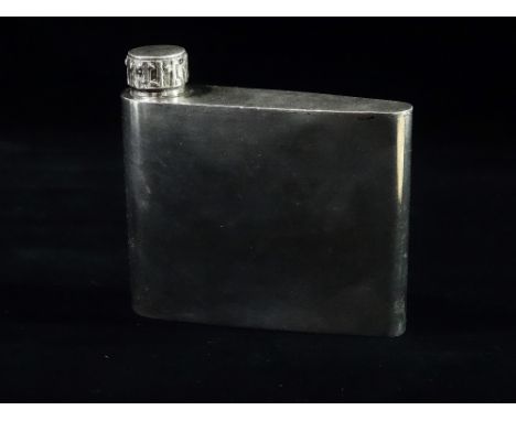 A silver hip flask in the form of a ship's rudder, with bark effect lid, London 1979, maker's mark BA, height 9cm, weight 6.2