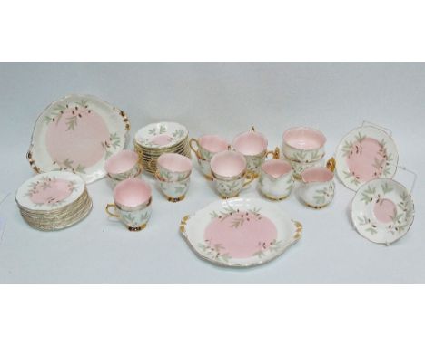 A Royal Albert 'Braemar' pattern tea service, comprising two cake plates, twelve side plates, twelve cups and saucers, two su