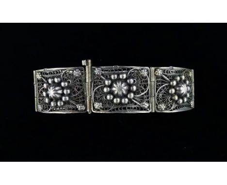 A continental silver filigree six panel bracelet, weight 32g approximately. 
