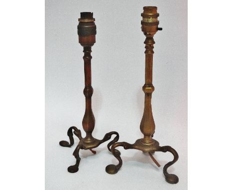 Two brass GWR Pullman style carriage table lamp bases, largest height 32cm.