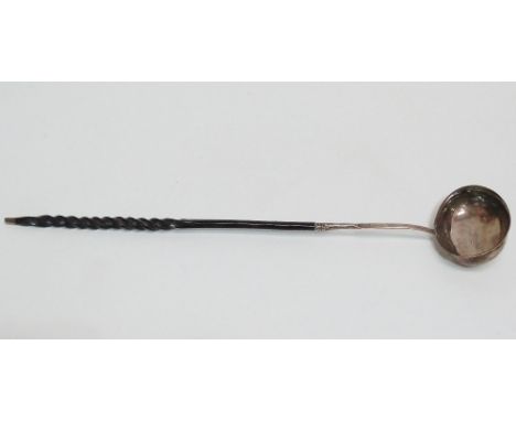 A George III toddy ladle with baleen handle, London 1788, maker Thomas Morley, length 28cm.