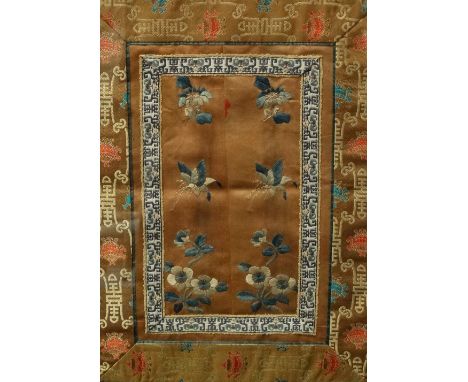 An early 20th century Chinese silk embroidered panel decorated with butterflies and flowers, framed and glazed, panel size 33