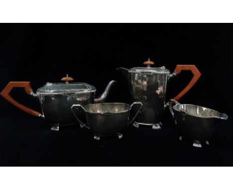 A four piece silver plated tea service, consisting of a teapot, hot water jug, cream jug and sugar bowl.