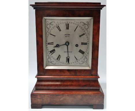 An early 19th century mahogany cased bracket clock by J. Wilson of Mount Street, Grosvenor Square, the silvered engraved dial