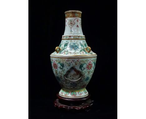 A fine late Qing dynasty Chinese porcelain Qianlong marked famille rose three section vase of waisted baluster form, decorate