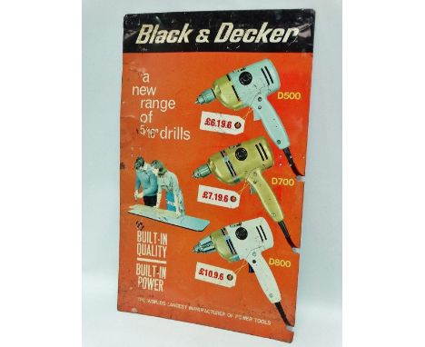 A 1960s tin advertising panel for Black &amp; Decker drills, 71 x 43cm. 
