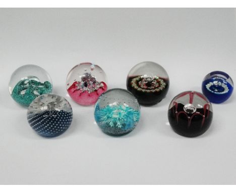 Caithness paperweights, seven various paperweights including 'Myrias', 'Polka', 'Seaform', 'Aquamarina', 'Maydance', 'Miniatu