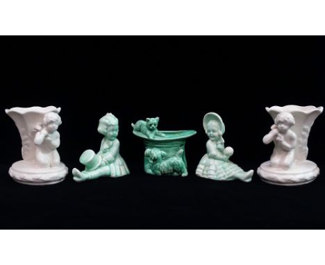A pair of Sylvac epergne figures, height 11.5cm, together with a pair of boy and girl cruets figures and a cat and dog top ha