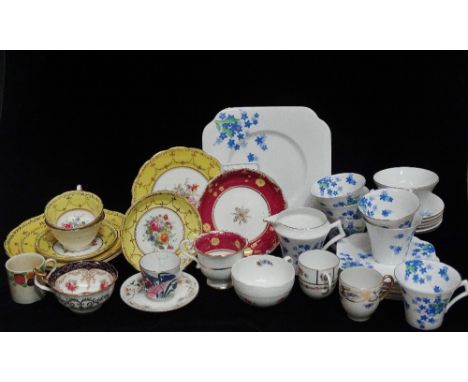 A Jackson &amp; Gosling part tea service of seven pieces gilt decorated with floral sprays, together with a Colclough part te