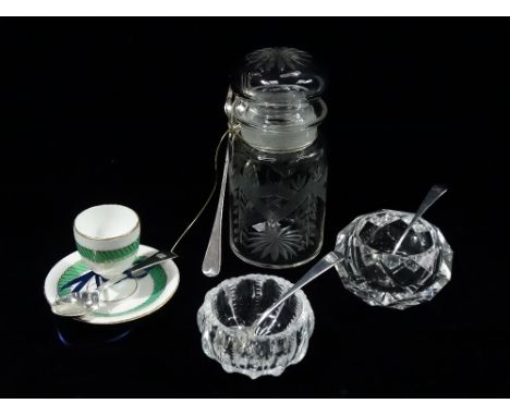 A glass table salt with related silver spoon, London 1821, together with a similar item, spoon dated 1830, a porcelain eggcup