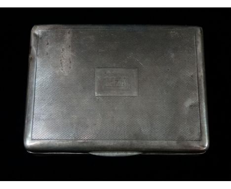 A silver engine turned cigarette box, the lid with engraved monogram 'CEK', London 1927, width 12cm.