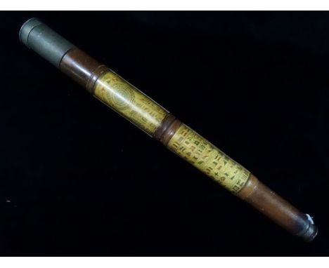 A late 19th century Dolland of London single draw telescope, the draw with engraved heraldic symbol possibly for Admiral Rich