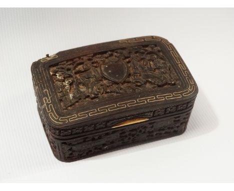 A fine early 19th century Chinese Canton carved tortoiseshell snuff box with panels depicting figures and buildings amongst t