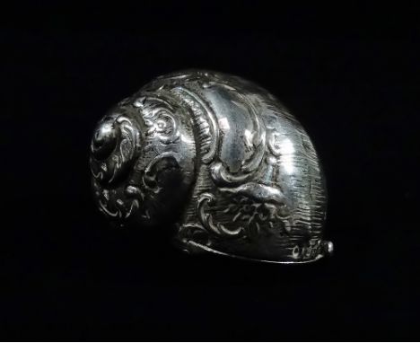 A silver snuff box modelled as a snail's shell with Rococo decoration, London 1894, maker Edwin Thompson Bryant, width 4.5cm,