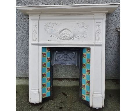 A late 19th century cast iron fire surround and grate decorated with flowering motifs, lacks mantle shelf, height 108cm, widt