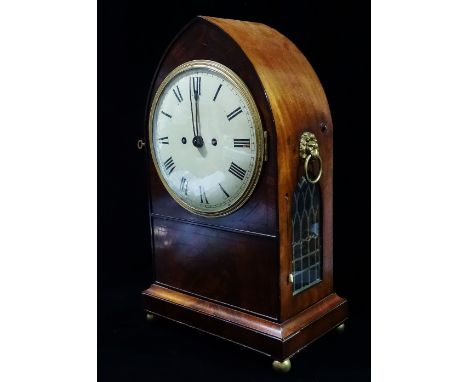 An early 19th century mahogany and ebony strung bracket clock of lancet form with twin fusee movement striking on a bell, the