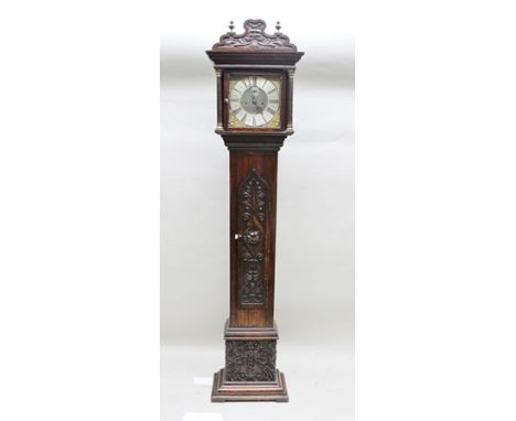 A GEORGE III OAK LONGCASE CLOCK, the eight day movement with cast spandrels and silvered chapter ring, with later carved deco