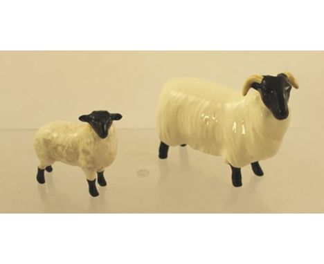 A BESWICK EARTHENWARE MODEL OF A RAM, 8cm x 10cm, and ANOTHER SHEEP, 6cm x 6cm (2) 