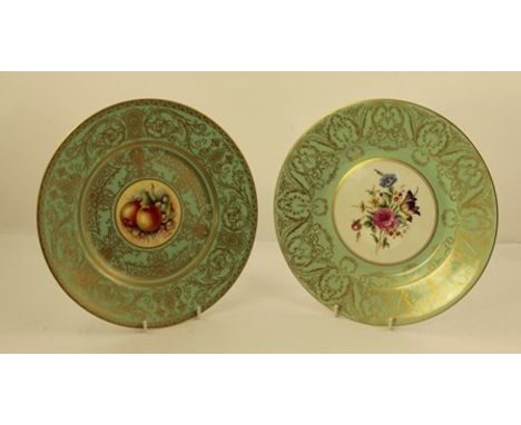 A PAIR OF ROYAL WORCESTER BONE CHINA PLATES, each with polychrome floral centre and sea green gilt surround, 27cm diameter, a