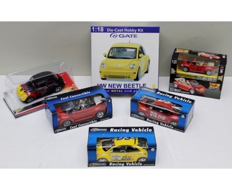 GATEWAY GLOBAL 1:18 SCALE DIE-CAST MODEL KIT VW new beetle in sealed OVB, three Teamster models of VW beetles boxed, Maisto 1