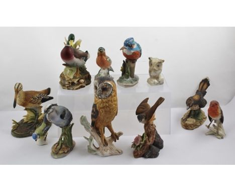 A "GOEBEL" PORCELAIN BARN OWL FIGURINE, 23cm high, together with OTHER CERAMIC BIRD ORNAMENTS includes Robin, Blue Tit, Road 