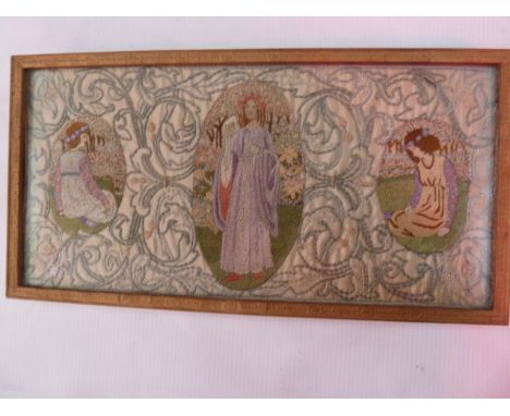 An early 20th century embroidered panel in Pre-Raphaelite style, rectangular with oval cartouche depicting maiden amongst gar
