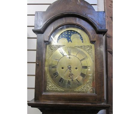 19th century longcase clock, the arched top with moonphase and striking eight-day movement, brass chapter ring with Roman num