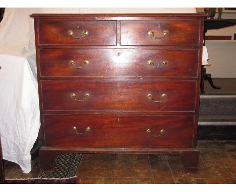 George III oak chest of two short and three long graduated drawers, with cockbead borders, brass swan- neck handles and brack