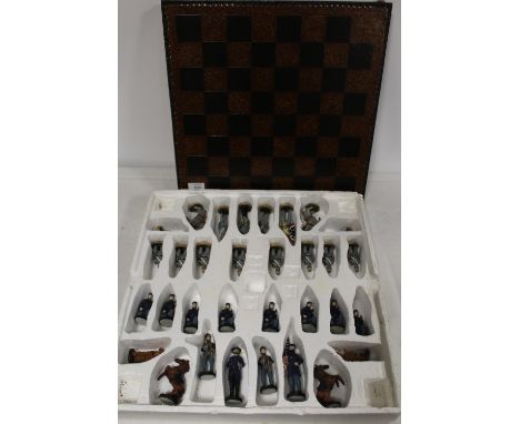 A MODERN RESIN CONFEDERATE ARMY USA CHESS SET 