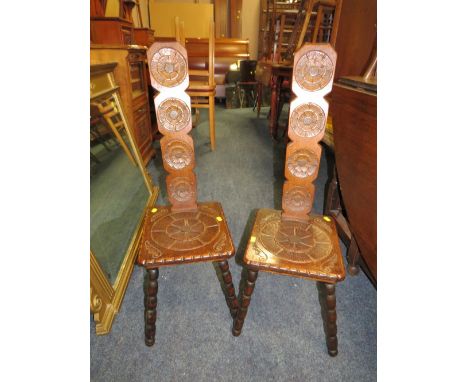 A PAIR OF VINTAGE CARVED OAK SPINNING STOOLS  TOGETHER WITH AN OCCASIONAL TABLE (3)