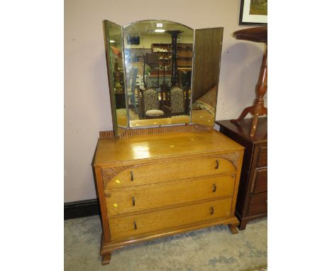 A VINTAGE OAK DRESSING TABLE WITH TRIPLE MIRROR