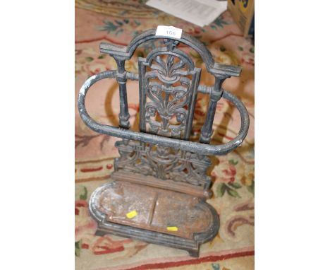 A SMALL CAST METAL STICK STAND - HEIGHT - 52CM