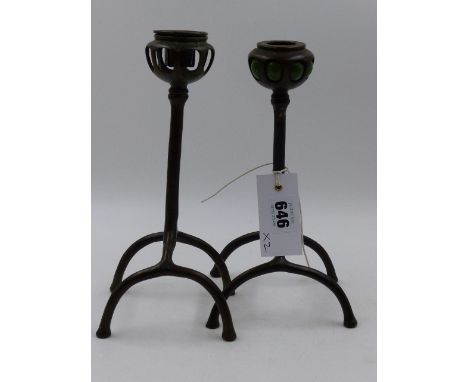 A NEAR PAIR OF BRONZE TIFFANY STUDIOS ORGANIC ROOT PATTERN CANDLESTICKS WITH BLOWN GLASS SOCKETS AND ONE WITH IMPRESSED MARKS