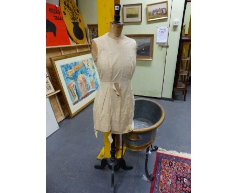 AN ANTIQUE MANNEQUIN OR DRESSMAKER'S FORM MARKED L&S 40.