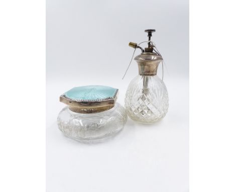 A SILVER AND ENAMEL TOP ETCHED CRYSTAL DRESSER BOX AND A STERLING SILVER TOP ATOMISER.   (2)
