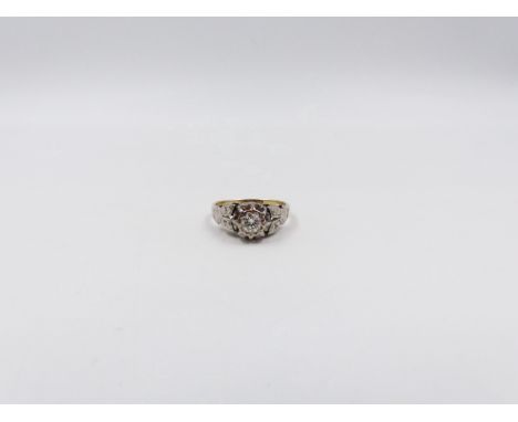 AN 18ct GOLD DIAMOND SINGLE STONE RING IN AN ORNATE VINTAGE STYLE MOUNT. 