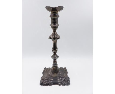 AN 18th C. CAST SILVER CANDLESTICK WITH CRESTED MARK. DATED 1762, TOWN MARK LONDON, MAKER E. COKER, APPROXIMATE HEIGHT 26cms.