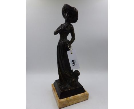 A BRONZE FIGURAL GROUP OF AN ELEGANT LADY WITH HER DOG ON MARBLE BASE.     H. 38cms.