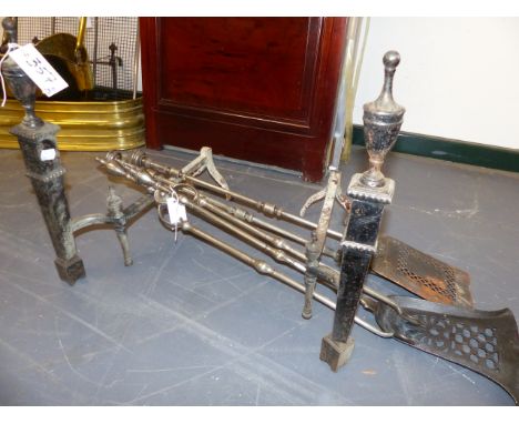 A PAIR OF GEORGIAN STYLE STEEL FIRE BASKET DOGS TOGETHER WITH TWO PAIRS OF FIRE TOOLS OF SIMILAR PERIOD.   (6)
