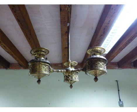 A VINTAGE BRASS THREE FONT HANGING LIGHT WITH PIERCED GOTHIC REVIVAL DECORATION.   H.66cms.